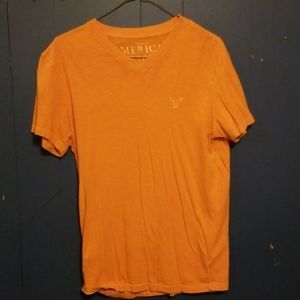 Small orange American eagle v neck